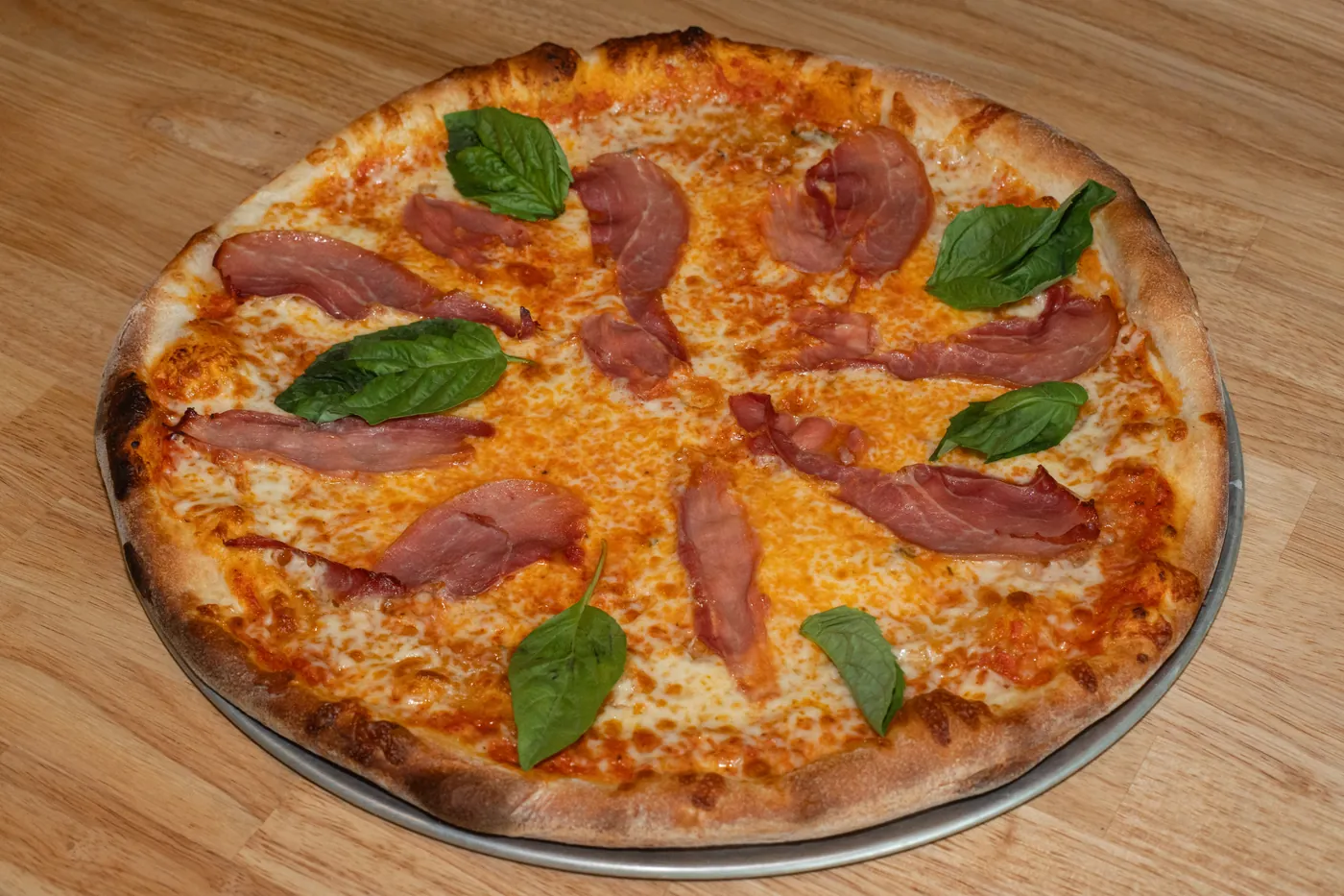 The Arthur Avenue pizza with prosciutto and basil