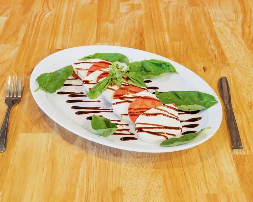Caprese salad with fresh basil and balsamic